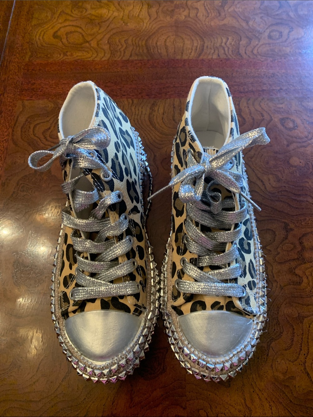 Olivia Miller Leopard Print High-Top Sneakers with Silver Metallic Accents